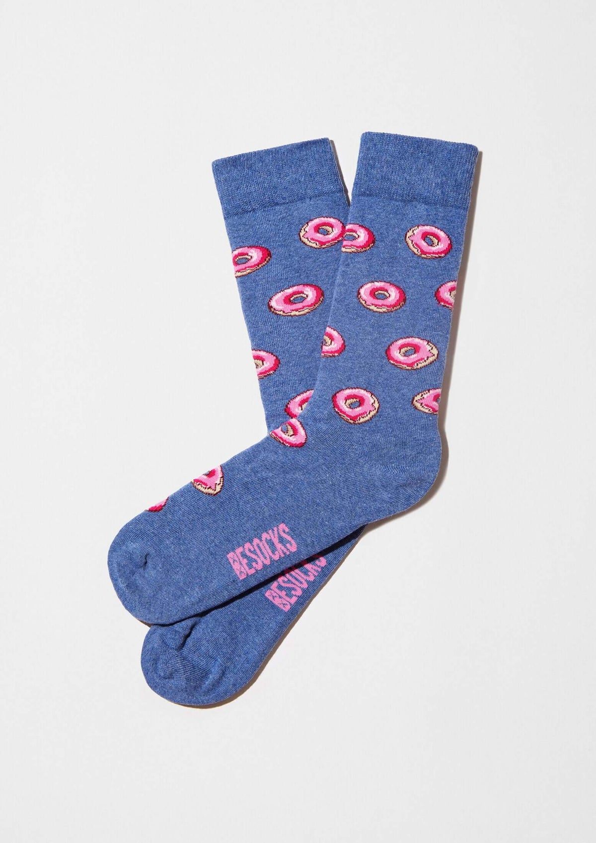 Calcetines BeDonut Blue con diseño de donuts sobre fondo azul melange, calcetines originales de BESOCKS.