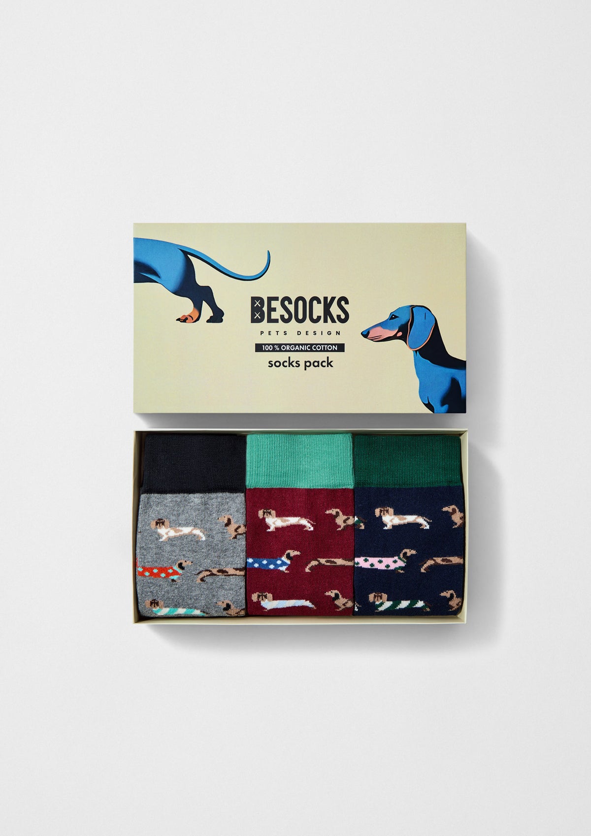 Pack Pets con tres calcetines de algodón orgánico en diferentes tonos, decorados con perros teckel.