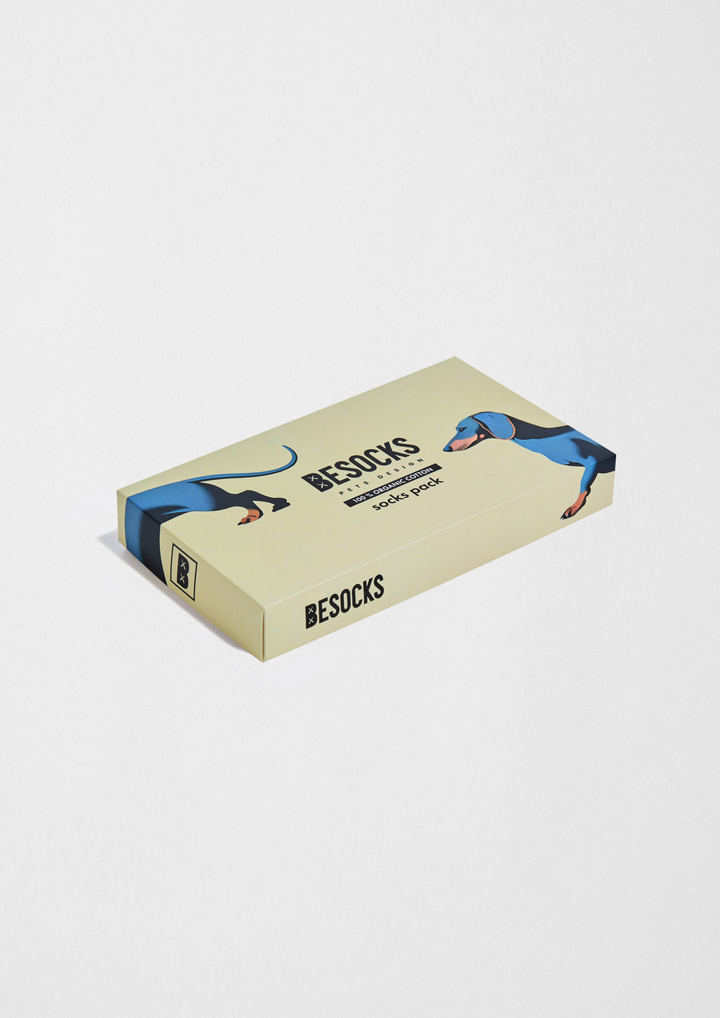 Pack Pets de BESOCKS en caja ilustrada con diseño de perro teckel en fondo camel.