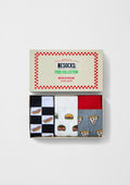 Pack Food de BESOCKS con calcetines de hot dog, hamburguesa y pizza en caja temática de diner americano.