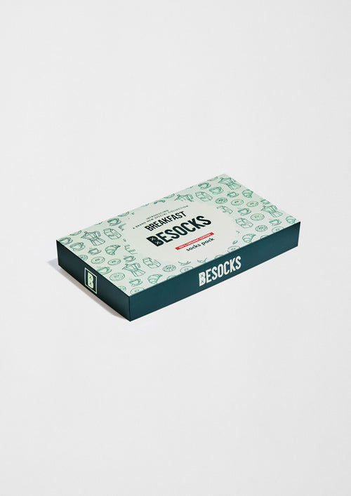 Pack Breakfast de BESOCKS con caja ilustrada que incluye calcetines inspirados en el desayuno.
