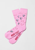 Calcetines altos BeSnoopy Heart Pink con dibujos de Snoopy y corazones rojos sobre fondo rosa de algodón orgánico.