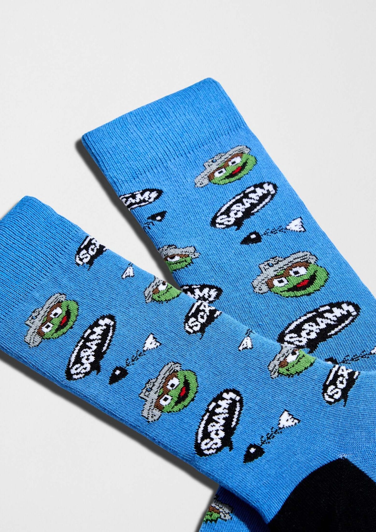 Calcetines BeSesameStreet Grouch con cara de Oscar el Gruñón y bocadillos en azul - BESOCKS
