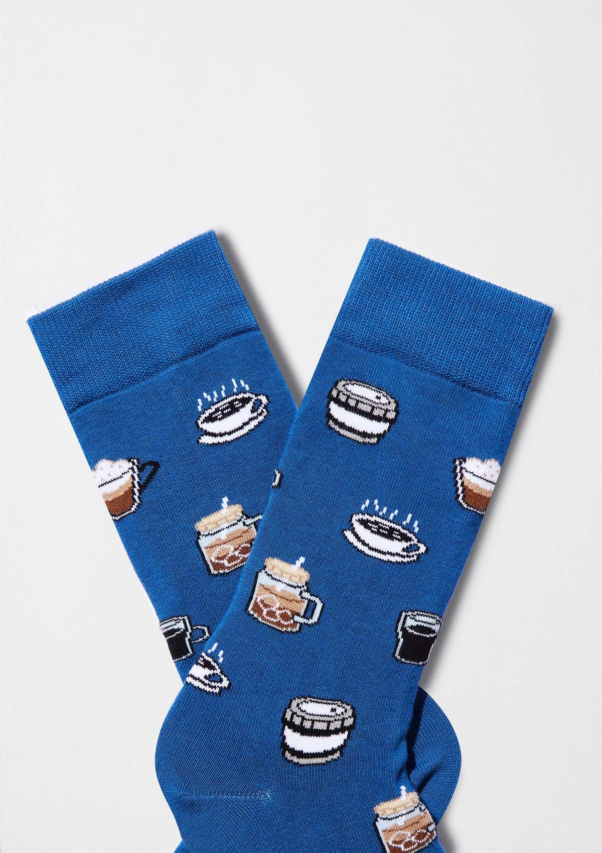 calcetines originales BeCoffee Blue con dibujos de tazas de café en estilo pixel art sobre fondo azul
