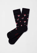 calcetines BeMushroom Black con dibujos de setas rojas y fondo negro, originales y coloridos.