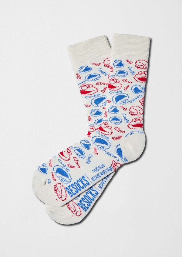 Caras de Elmo y Triki en color rojo y azul sobre base off-white - BESOCKS. calcetines BeSesameStreet Elmo & Cookie Faces.