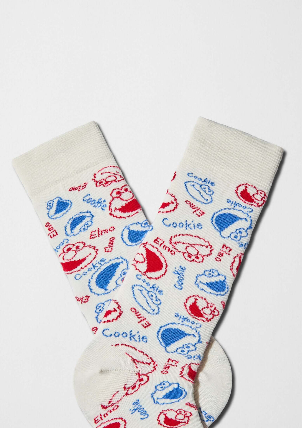 Diseño con caras de Elmo y Triki en rojo y azul sobre fondo off-white - BeSesameStreet Elmo & Cookie Faces - BESOCKS