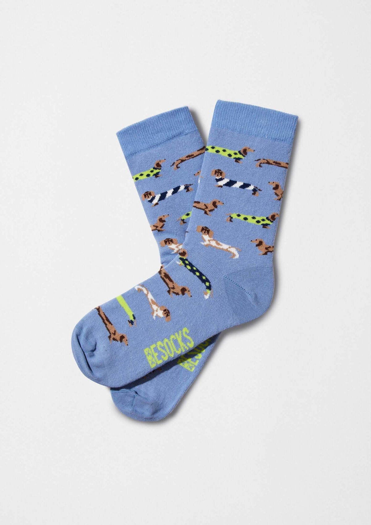 Calcetines BePets Woman Blue con base azul y patrones de perros salchicha, altura tobillero.