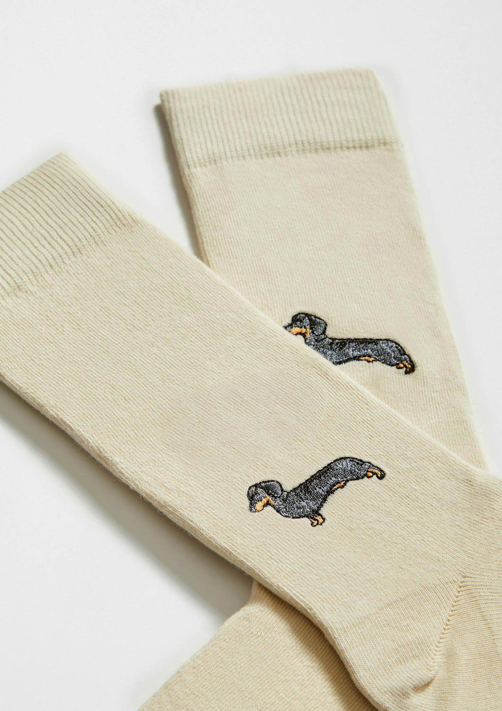  calcetines beige con bordados de perros 