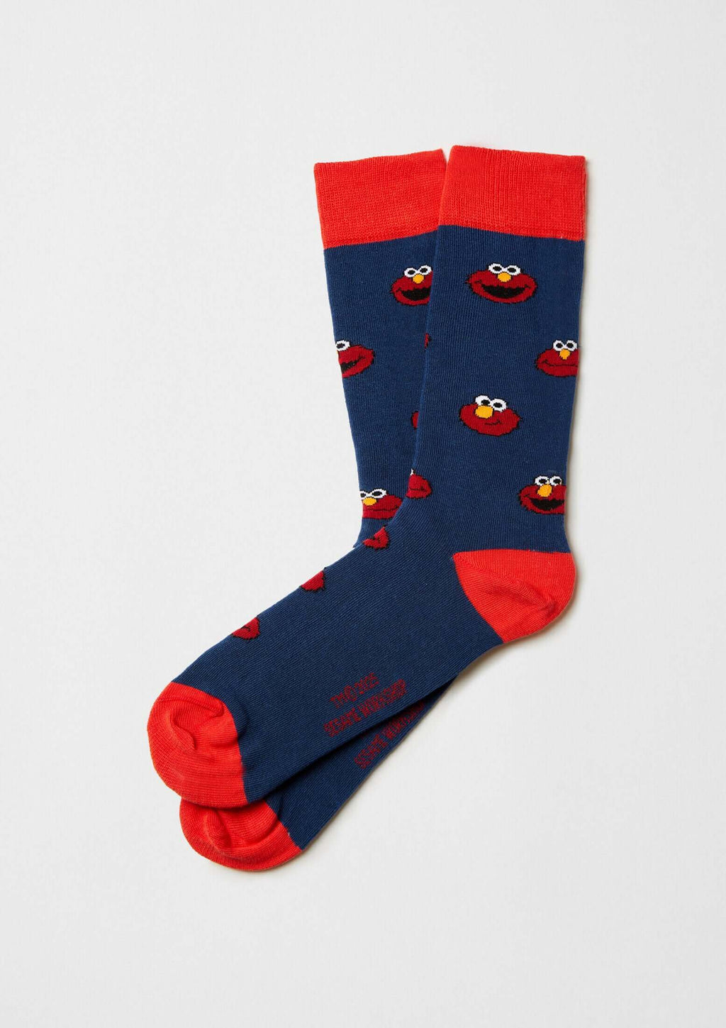 Calcetines BeSesameStreet Elmo Navy con estampado de Elmo en azul marino y detalles rojos, de altura tobillera.