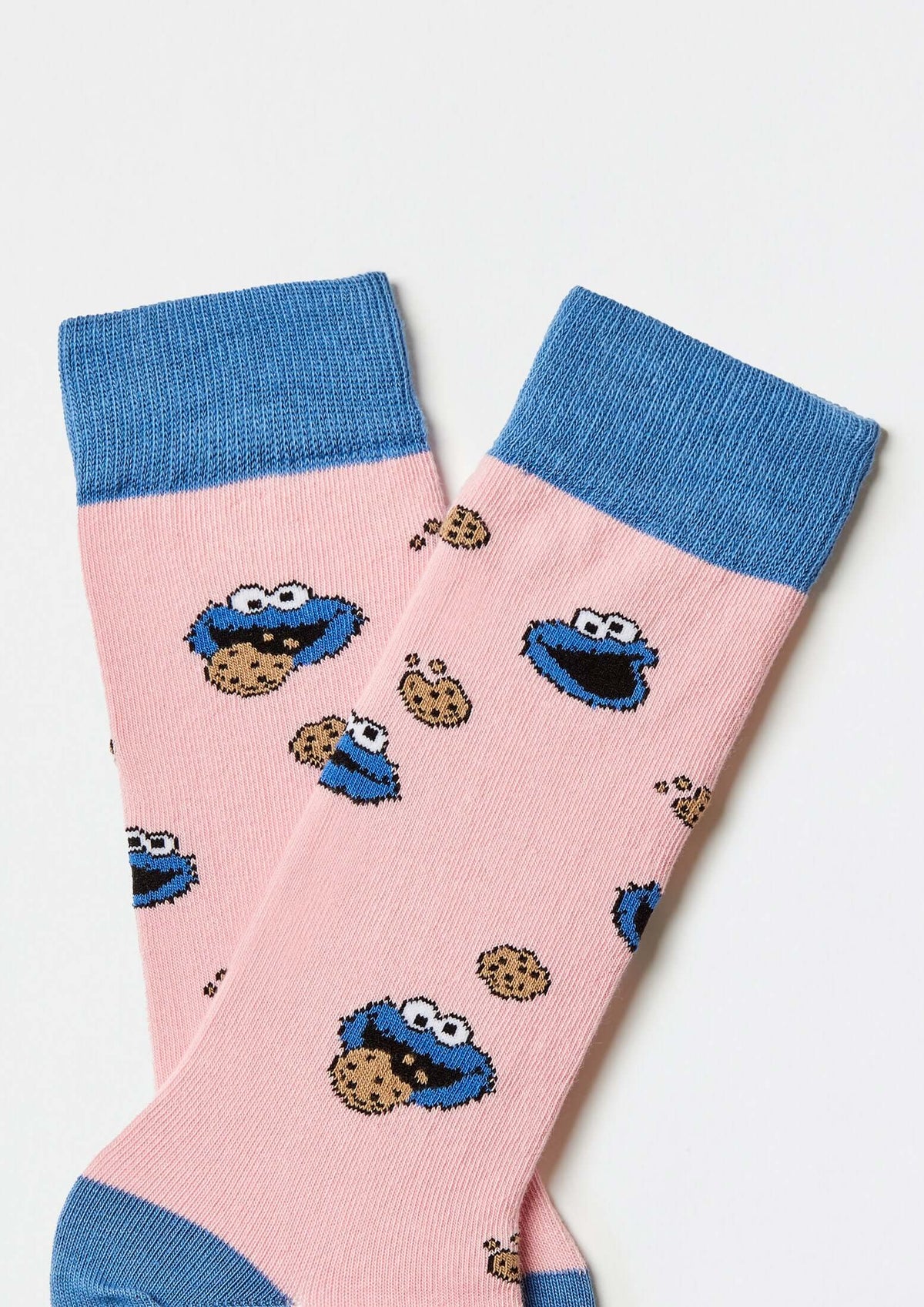 Calcetines BeSesameStreet Cookie Monster Pink de media caña en rosa con estampado de Cookie Monster y galletas.