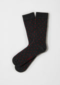 calcetines oscuros con puntos