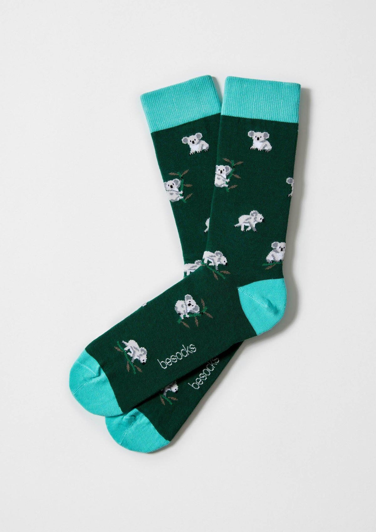 calcetines verdes con dibujo de koalas
